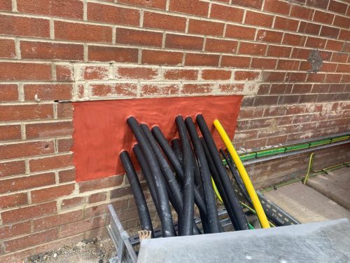 Pipes going through seal on wall