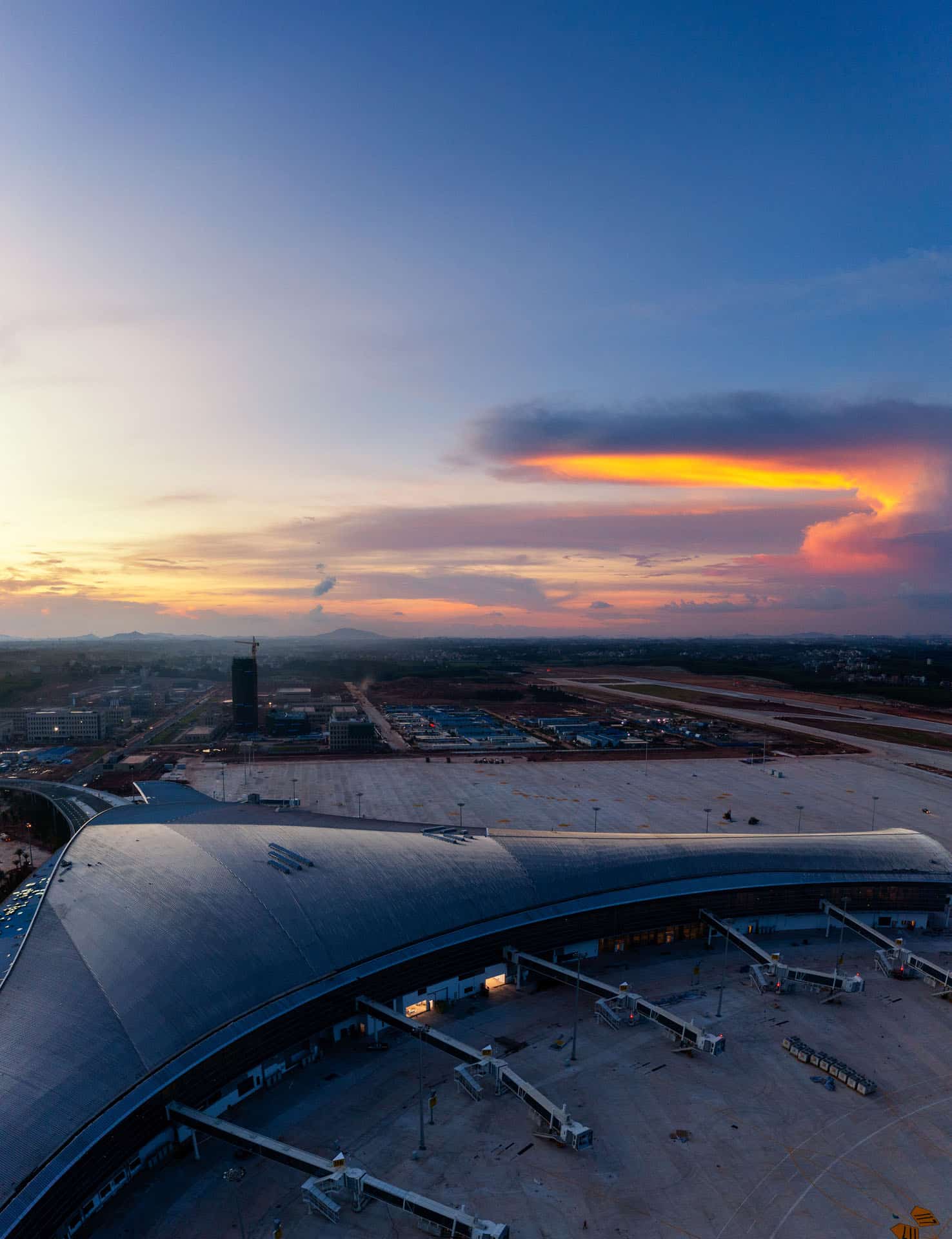 Aerial shot of airport at sunset