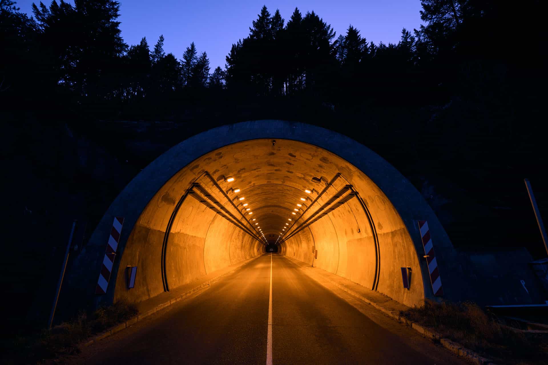Looking into a light road tunnel at night