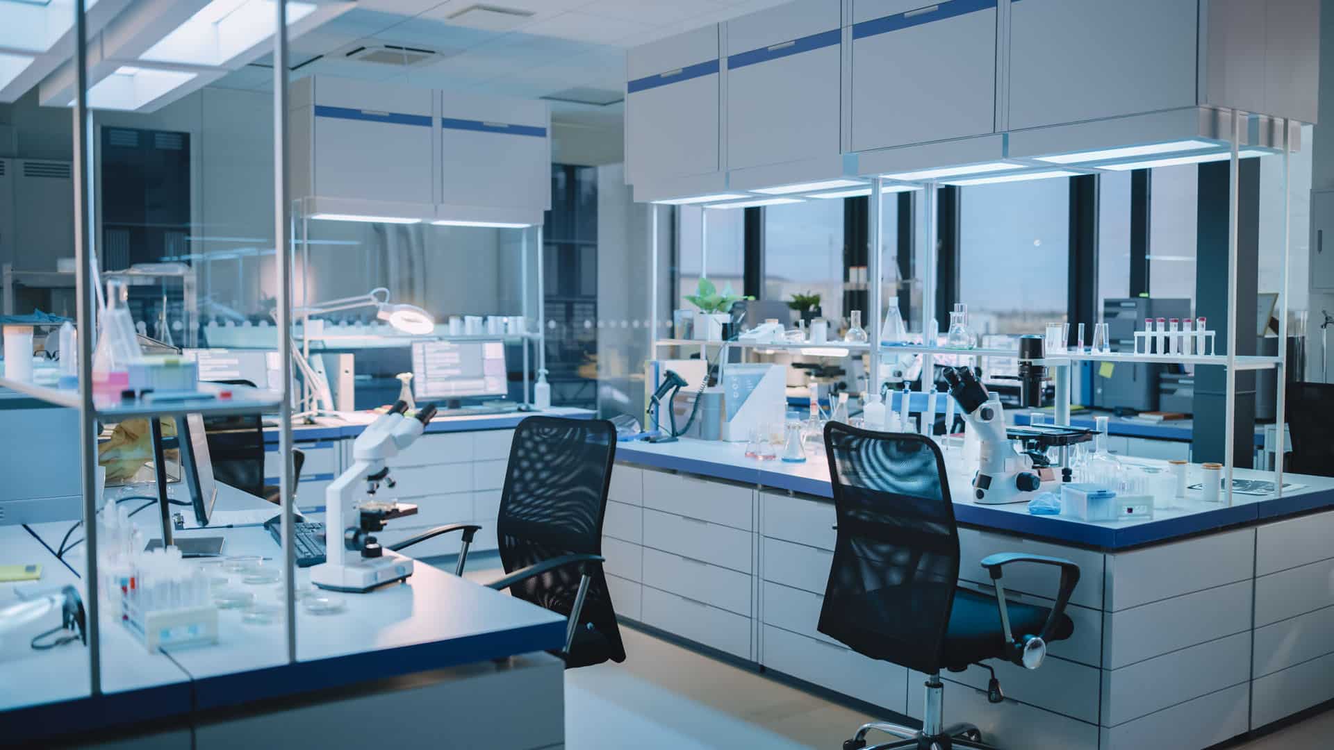 White laboratory with microscopes