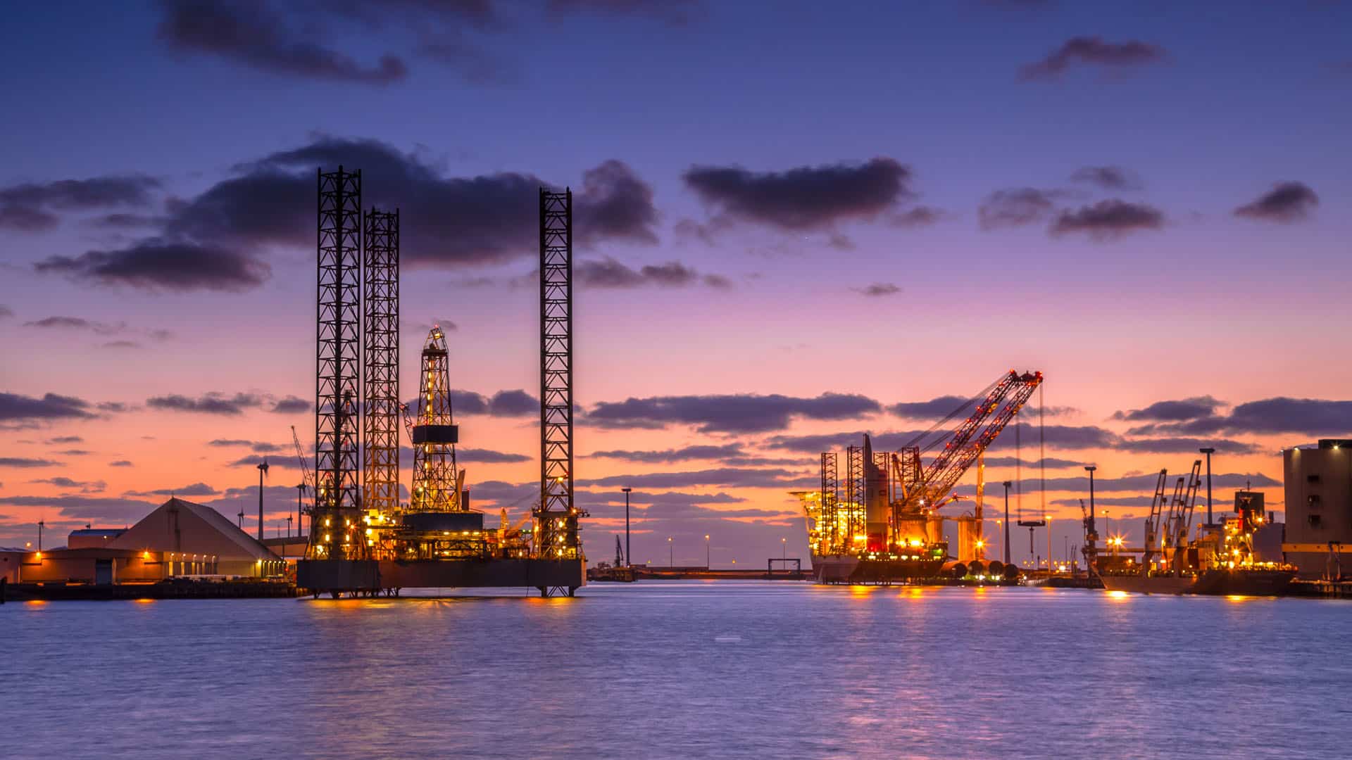 Sunset view of oil drilling rig under construction