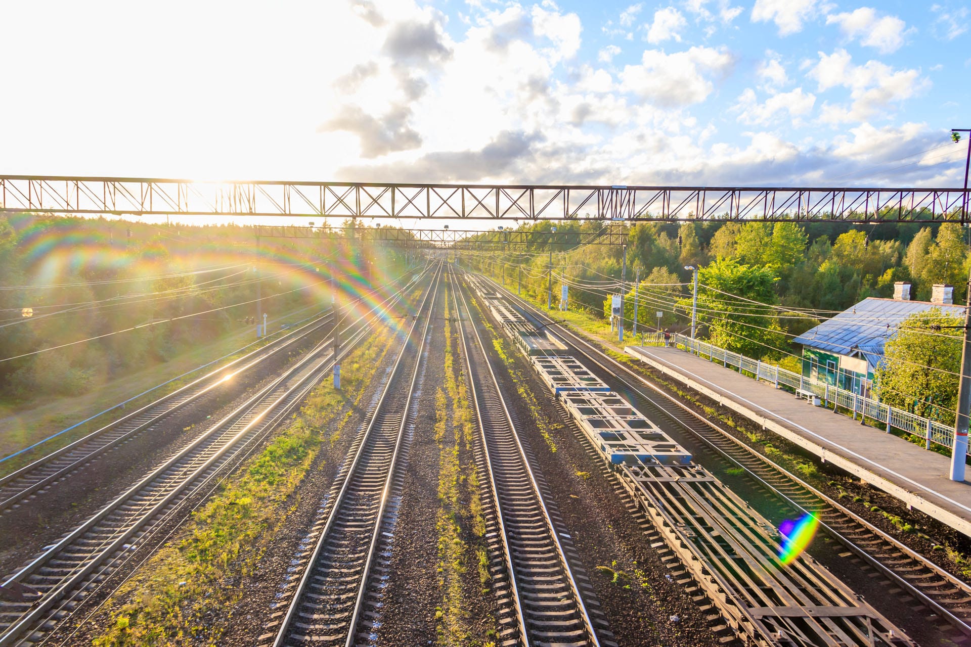 View looking down railway lines in the evening