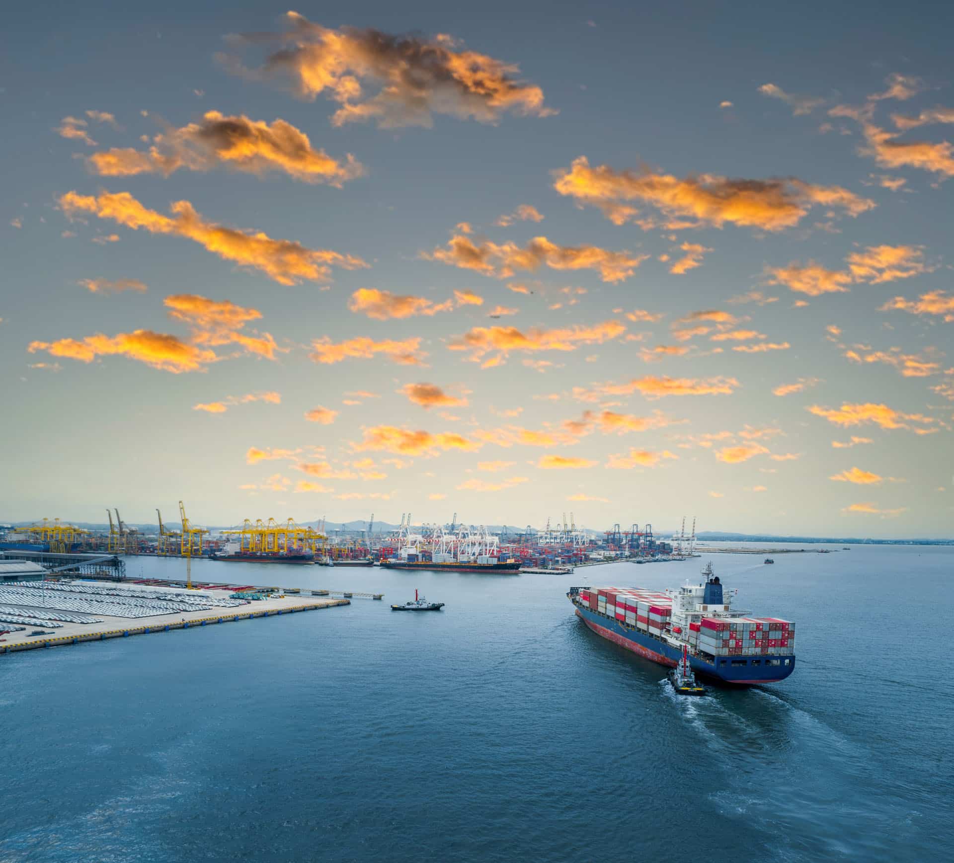 Aerial view of container ship entering port